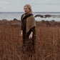 The Island and the Forest: A Knitted Correspondence