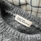 "Gentle wash, dry flat, mend if torn." label by Petiteknit