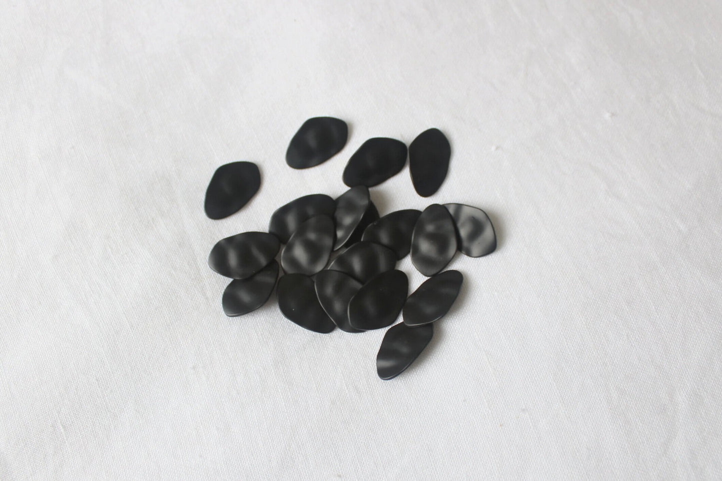textured matte black metal buttons 25mm x 15mm