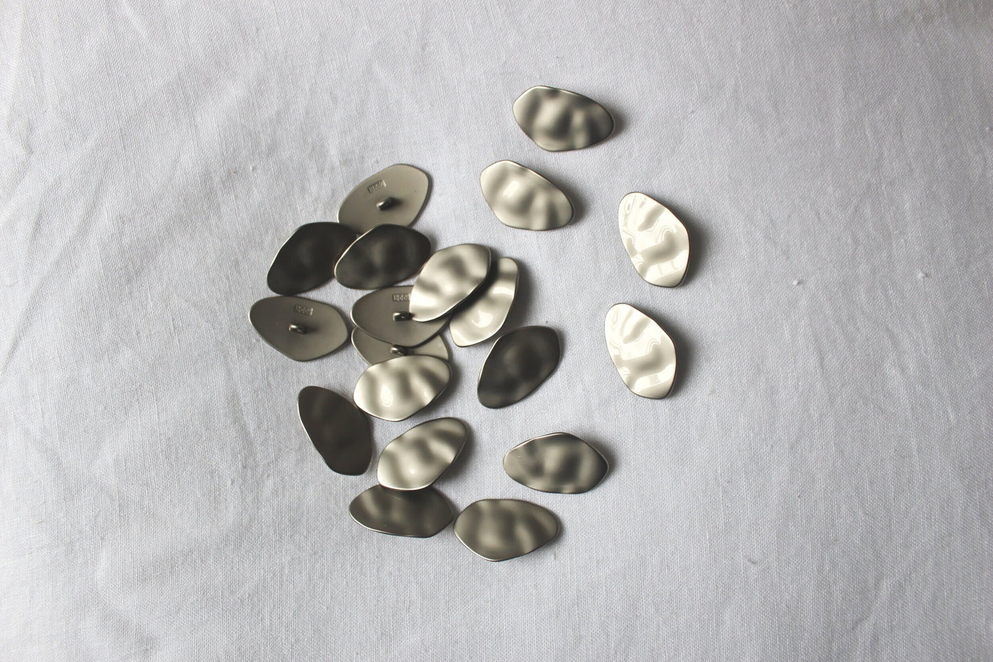large textured matte silver metal button 35mm x 22mm